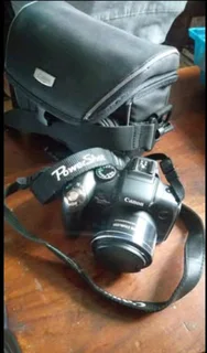  CAPTURE THE MOMENT! For Sale: Canon PowerShot SX1 IS Super Zoom Camera 