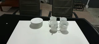 8 tea cups and sauces