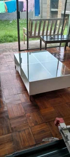 Klooftique 4 quadrant glass top coffee table