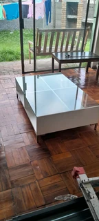 Klooftique 4 quadrant glass top coffee table