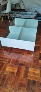 Klooftique 4 quadrant glass top coffee table