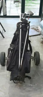 Pinseeker Golf Clubs, golf bag and golf trolley