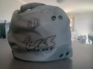 Fox V3 offroad motorcross helmet and carry bag still new . Signature model. 2500