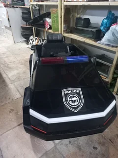 Electronic bluetooth police car for children. It is brand new with a remote.