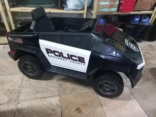 Electronic bluetooth police car for children. It is brand new with a remote.