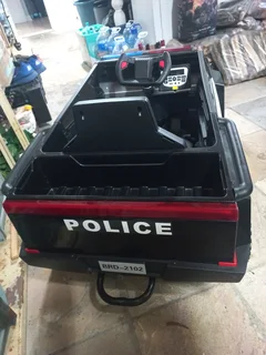 Electronic bluetooth police car for children. It is brand new with a remote.