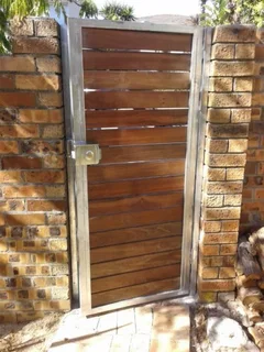 Gates - Wood Driveway Sliding Gates - Remote Controlled Gates - Wood Composite - Meranti Gates