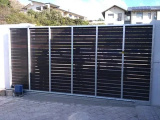 Gates - Wood Driveway Sliding Gates - Remote Controlled Gates - Wood Composite - Meranti Gates