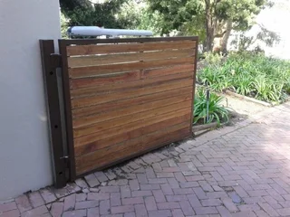 Gates - Wood Driveway Sliding Gates - Remote Controlled Gates - Wood Composite - Meranti Gates