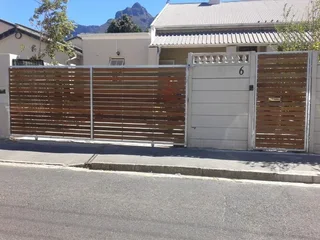 Gates - Wood Driveway Sliding Gates - Remote Controlled Gates - Wood Composite - Meranti Gates