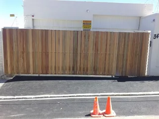 Gates - Wood Driveway Sliding Gates - Remote Controlled Gates - Wood Composite - Meranti Gates