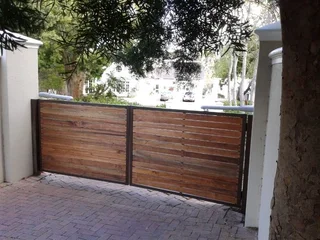 Gates - Wood Driveway Sliding Gates - Remote Controlled Gates - Wood Composite - Meranti Gates