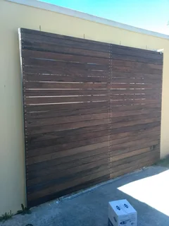 Modern Gates - Driveway Sliding Gates - Remote Controlled Gates - Wood Composite - Meranti Gates