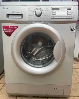 8kg LG FRONT LOAD WASHING MACHINE IN EXCELLENT WORKING CONDITION