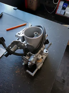 NISSAN NP300 KA20 16V /KA24 16V COMPLETE THROTTLE BODY IN STOCK FOR SALE.