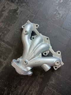 Nissan Np200 K7mf Brand New Exhaust Manifold In Stock For Sale.