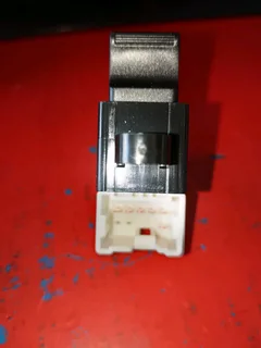 NISSAN HARDBODY/NP300 LEFTSIDE  FRONT WINDOW SWITCH BRAND NEW IN STOCK FOR SALE.