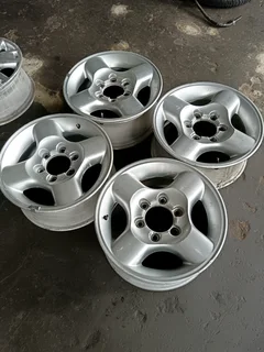 NISSAN NP300 16INCH MAGS IN STOCK FOR SALE