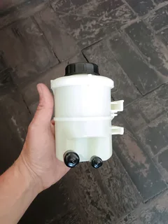 Nissan Np200 Brand Power Steering Fluid Bottles In Stock For Sale.