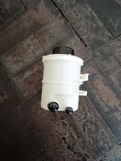 NISSAN NP200 BRAND POWER STEERING FLUID BOTTLES IN STOCK FOR SALE.