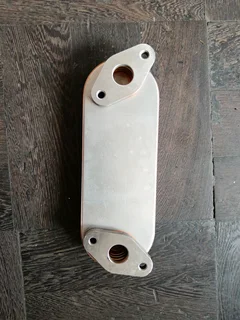 FORD/MAZDA WLAT BRAND NEW OIL COOLER IN STOCK FOR SALE.