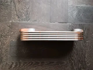 FORD/MAZDA WLAT BRAND NEW OIL COOLER IN STOCK FOR SALE.