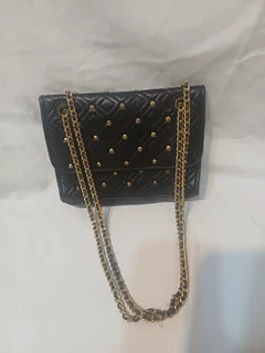 Pre-loved Studded Tory Burch handbag for sale