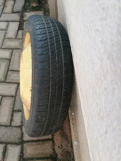 BMW T135/70r15 biscuit spare wheel