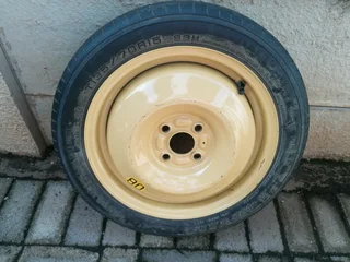 BMW T135/70r15 biscuit spare wheel