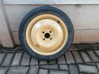BMW T135/70r15 biscuit spare wheel