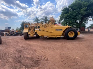 Caterpillar 615 Self elevating Belly scrapers