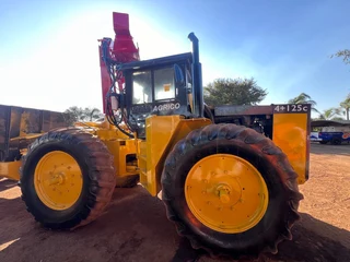 Agrico 4&#43;125c tractor / tandem trailer combo