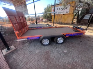 O-Range tandem axle ( un used) 4 ton Bobcat trailers