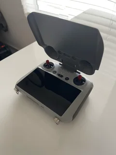 DJI RC Smart Controller with sun cover.