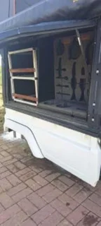 Used Alu-Cab Camper on Land Cruiser Bin
