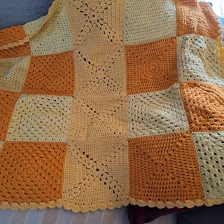 Hand knitted and crochet baby blankets and clothing