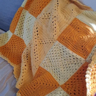 Hand knitted and crochet baby blankets and clothing