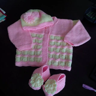 Hand knitted and crocheted baby blankets, jerseys, beanies and bootee