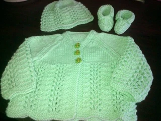 Hand knitted and crocheted baby blankets, jerseys, beanies and bootee