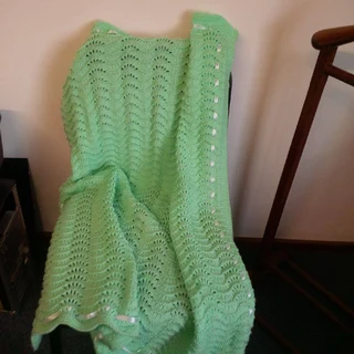 Hand knitted and crocheted baby blankets, jerseys, beanies and bootee