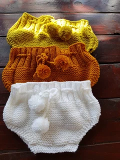 Hand knitted and crocheted baby clothing and blankets and more