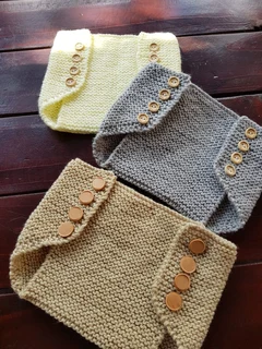 Hand knitted and crocheted baby clothing and blankets and more