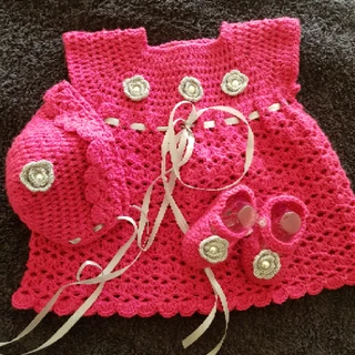 Crocheted and knitted baby dresses, jackets, jerseys, beanies, booties, blankets and more
