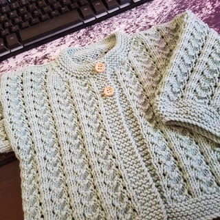 Crocheted and knitted baby dresses, jackets, jerseys, beanies, booties, blankets and more