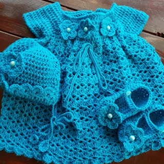 Crocheted and knitted baby dresses, jackets, jerseys, beanies, booties, blankets and more