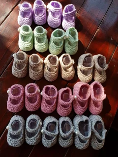 Crocheted and knitted baby dresses, jackets, jerseys, beanies, booties, blankets and more
