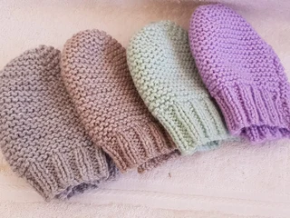 Knitted and crocheted baby wear, blankets and more