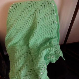 Hand knitted and crocheted baby garments and blankets