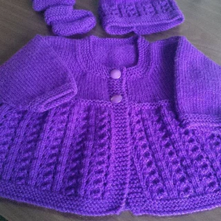 Hand knitted and crocheted baby garments and blankets