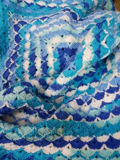 Hand knitted and crocheted baby wear and blankets of all sizes